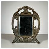 Cast Metal Mirror | Small beveled glass mirror set in cast metal frame featuring swans, flora & faun
