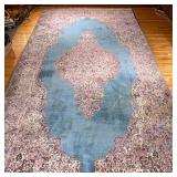 Large Blue Rug | Large blue rug with pink and purple floral patterns. - l. 210 x w. 107 in 