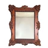 Carved Mirror | Walnut Mirror with ornate carving on border. - l. 30 x h. 36 in 