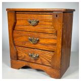 MINIATURE SIDE-LOCK CHEST | Chest with Walnut case and oak drawers. Brass handles and side-locks wit