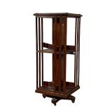 REVOLVING BOOKCASE | Revolving Two Tier Bookcase of small size.Brass molding along tops edges with a