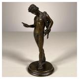 BRONZE NUDE OF A MAN | Roman bronze figure with a cape no apparent mark - dia. 2 in. (Base diameter)