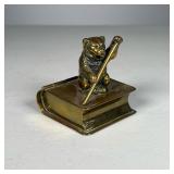 BEAR ON A BOOK: STAMP BOX | Small Brass Bear on Book with stick. Lid opens to stamp slots. 