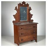 MINIATURE CHEST WITH MIRROR | Miniature Chest with Mirror on carved brackets. Three drawers. 