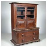 MINIATURE STEP BACK CUPBOARD | Mahogany Cupboard with two doors over two drawers. 