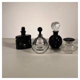 (4pc) BLACK GLASS PERFUME BOTTLES | Both cut and blown black glass perfume bottles. - dia. 2.5 in. (