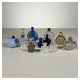 (13pc) SMALL PERFUME BOTTLES | A collection of mixed miniature perfume bottles. - dia. 2 in. (larges