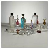(11pc) PERFUME BOTTLES | Assorted figurines including; shoes, animals, a hand, and other artistic st