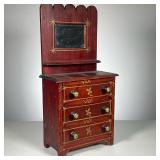 MINIATURE CHEST WITH MIRROR | Chest in a red finish with gold accent painting. 