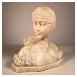 A GENNAY MARBLE BUST | White Marble bust of a woman with scarf.Signed on back A. Gennay. 