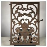 SMALL IRON DOOR | Small Iron door with nice sheet metal interior urn decoration. 