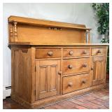 RUSTIC LIGHT PINE SIDE CABINET | having an open shelf with turned supports and a semi-hidden power o