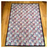 AMERICAN ANTIQUE HOOKED RUG | showing patterns of squares, apparently unsigned. - l. 85 x w. 58 in