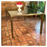 MID-CENTURY MASTERCRAFT METAL & GLASS DINING TABLE | After designs by Milo Baughman, 3/4 inch temper