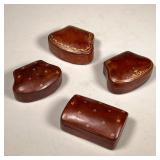 (4PC) GILT LEATHER BOXES | One marked "Italy" two decorated with scrollwork, two with gilt stars. - 