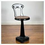 CAST IRON PAINTED SWIVEL STOOL | Painted cast iron with a swivel seat; could be a soda fountain chai