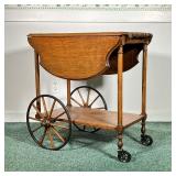 ANTIQUE DROP-LEAF WOODEN BAR CART | Antique bar cart with drop leaf sides and spring-loaded pop-out 