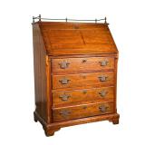 SLANT TOP DRESSER AND WRITING DESK | Slant top dresser with 4 drawers and fold-out writing desk on t