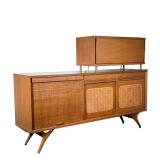Mid-century Bar Cabinet | The lower section with a tambour door next to double cane front sliding do