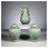 (3pc) Celadon Garniture | Chinese sculpted celadon, including a vase and two lidded jars. - h. 7.5 x