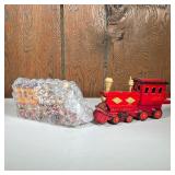  (2pc) Wood Train Models | Painted wood. - l. 8.25 x h. 4.5 in (red engine) 