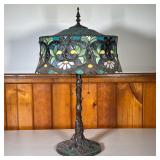 STAINED GLASS LAMP W/GREEN SHADE | Elaborate base with leaves and a vine. Green stained glass on bas