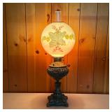 BANQUET LAMP | Banquet Lamp with a white metal flower embossed base. Globe shade is hand painted and