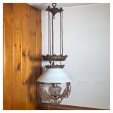 HANGING OIL LAMP | 19th C Gilded iron hanging oil lamp with milk glass shade. Electrified, but not d