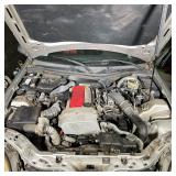  Two-tone Red Leather (227A) across the seats and door cards . 