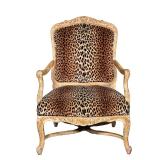 CHEETAH PRINT ARMCHAIR | Large wide armchair with cheetah-print cushion and composite frame. - l. 30