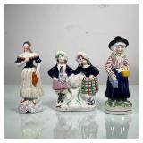 (3PC) FEMALE CERAMIC FIGURINES | Includes pair of women leaning on clock, dressed up women with picn