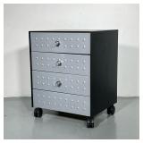 ROLLING METAL CABINET | Black metal cabinet with 4 wooden drawers with metal faces and magnetic pull