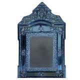 ORNATE BEVELED MIRROR WITH INTRICATE BRASS RELIEF | Beveled mirror with ornate stamped brass relief 