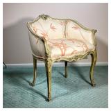 FRENCH CARVED SLIPPER ARMCHAIR | Carved wood frame with curved back leading to pink rose cushions on