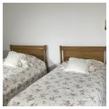 (2PC) PAIR WOODEN TWIN BED FRAMES | Two twin wooden bed frame; probably National Furniture. - l. 78.