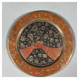 CHASED ENAMELED PEACOCK PLATE | Stylish red-and-black floral decorative enamel plate featuring two e