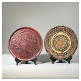 (2PC) CARVED WOODEN PLATES | Two hand carved plates, one with paint decoration. Intricate, swirling 