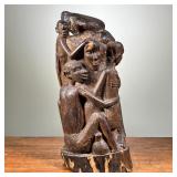 LARGE AFRICAN CARVED SCULPTURE | African wooden carving. Depicts large family or group of people emb