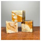 (3PC) ONYX CUBES | Three small onyx cubes with marbled stone pattern. - l. 2.5 x w. 2.5 x h. 2.5 in 