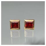 PAIR GARNET & 14K GOLD EARRING | square garnets approx. 5.5 x 5.5 mm set in 14k gold surround total 