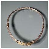 18K GOLD & STERLING SILVER DOLPHIN NECKLACE | marked "950 / K18 / (omega) W - " approximately 16 in.