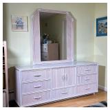 RATTAN DRESSING CONSOLE | Having a mirror over a glass top, seven drawers and double cabinet doors; 