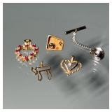 (4PC) 14K PENDANTS & OTHER JEWELRY | Including a contemporary tie pin marked "14k / JK" mounted with