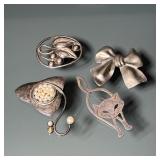 (4PC) STERLING SILVER PINS | Including a bow form pi (missing pin), a cat form pin, a pin mounted wi