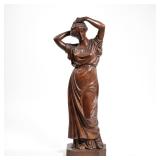 ANTIQUE CARVED WOOD FIGURE | An antique intricately carved wood figure of a woman, no apparent signa