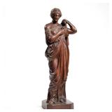 ANTIQUE CARVED WOOD FIGURE | An antique intricately carved wood figure of a woman donning a robe, no