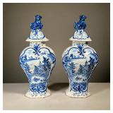 (2pc) PAIR CHINOISERIE URNS | Blue and white pottery lidded jars/urns with blue underglaze, likely D