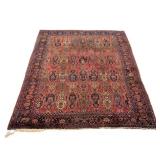 ANTIQUE NORTHWEST PERSIAN CARPET | With overall pattern of gulls in a blue border - l. 144 x w. 107 