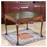 ANTIQUE CARVED GAMES TABLE | English, 18th/19th-century oblong egg and dart carved edge, inset leath