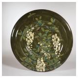 ROZENBURG DEN HAAG CHARGER | C. 1895. With green glaze, signed on the bottom and numbered 328 - dia.